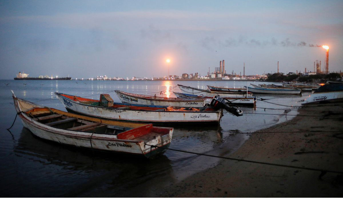 Fishing boats are moored down the coast